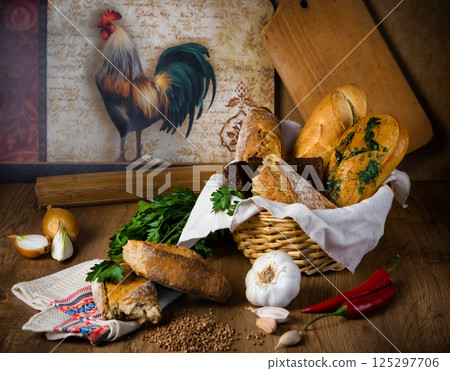Fresh bread, buckwheat bread, garlic bread, French baguette Fresh bread, buckwheat bread, garlic bread, French baguette 125297706