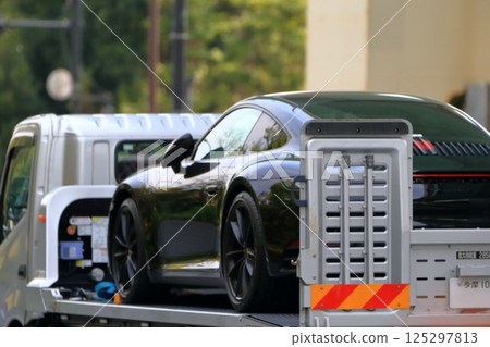 Image of a sports car being transported 125297813