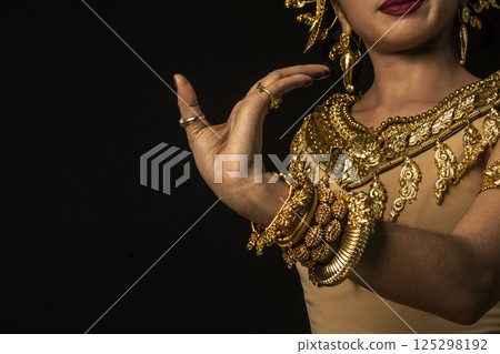 close detail of Khmer apsara  performer of traditional dance in cambodia close detail of Khmer apsara  performer of traditional dance in cambodia 125298192