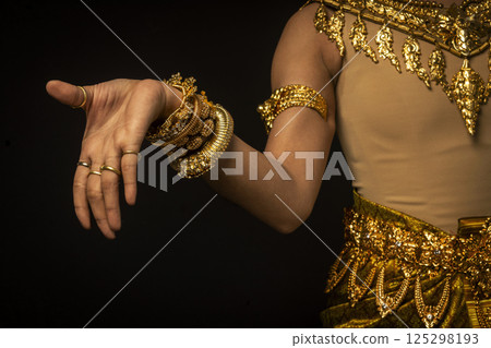 close detail of Khmer apsara  performer of traditional dance in cambodia close detail of Khmer apsara  performer of traditional dance in cambodia 125298193