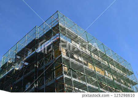 Scaffolding installed at construction site 125298610