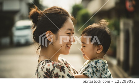 Mother and child smiling 125299053