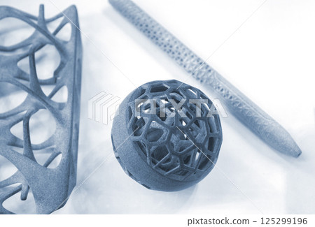 Model printed on 3D printer from grey polyamide powder close-up. Detailed prototype created on 3D printer from plastic powder. 3D printing additive powder technology, Multi Jet Fusion MJF technology 125299196