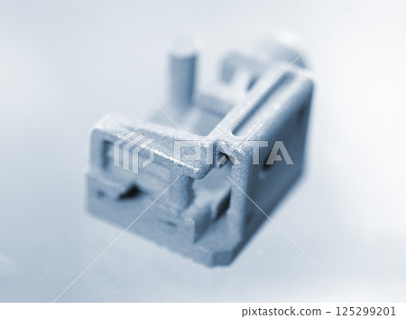 Metal object printed on 3D printer from metal powder. Model created on 3D printer from metal powder. Metal Jet technology. New modern 3D printing technologies. Additive progressive technology. Concept 125299201