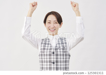 Female office worker, fist pump, white background 125301311
