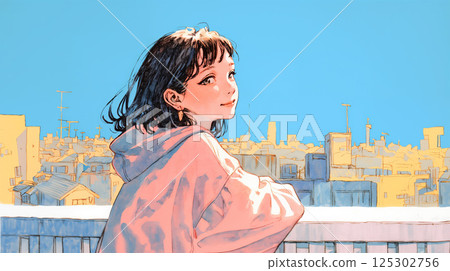Young woman looking at the city from the rooftop 125302756