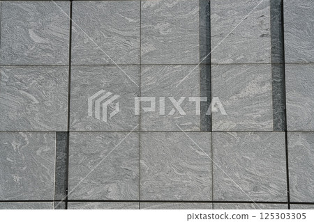 Black tile wall 125303305