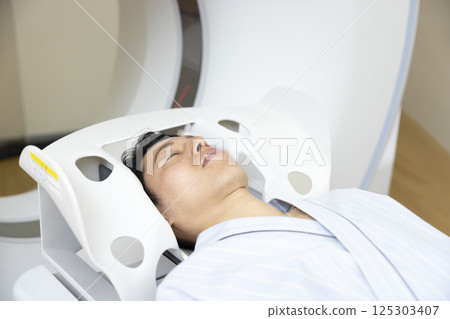 Medical: Man undergoing CT scan. Photo courtesy of Denpa Gakuen, Tokyo Electronics College. Medical: Man undergoing CT scan. Photo courtesy of Denpa Gakuen, Tokyo Electronics College. 125303407