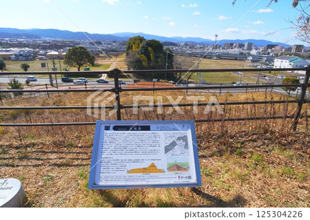 Huge earthworks remain at the Mizuki ruins, a special national historic site 125304226