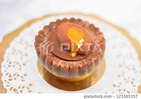 Decorated cake made from cupcakes Decorated cake made from cupcakes 125305357