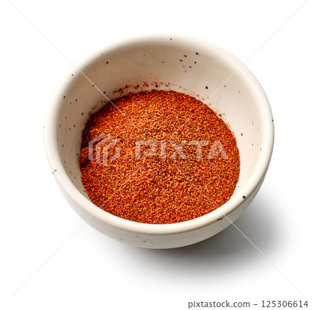 bowl of red paprika powder 125306614