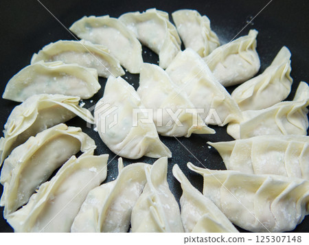 Gyoza before cooking Gyoza before cooking 125307148