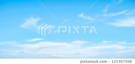 Bright blue sky with scattered white clouds, peaceful atmosphere perfect for photography, nature scenes, web design, visual content, digital project and inspiring background Bright blue sky with scattered white clouds, peaceful atmosphere perfect for photography, nature scenes, web design, visual content, digital project and inspiring background 125307508