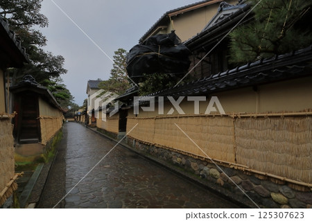 Beautiful rain-soaked stone pavement at the site of the Nagamachi samurai residence in Kanazawa 125307623