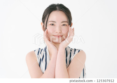 A beautiful woman with skin 125307912