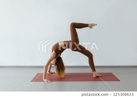 Slim body and health care. Urdhva Dhanurasana , Inverted Bow Pose or Bridge Pose 125308633