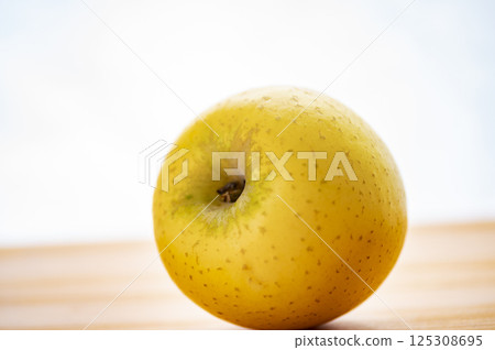 Yellow apple 125308695