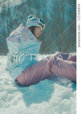 backache, lower back pain, snowboard 125308854