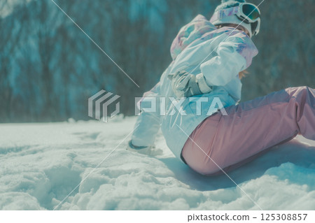 backache, lower back pain, snowboard 125308857