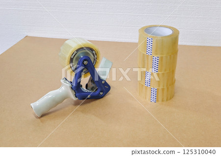 dispenser and stack of reel of scotch tape 125310040