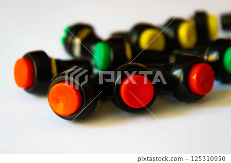 Colorful Panel Push Buttons on White Surface Colorful Panel Push Buttons on White Surface 125310950