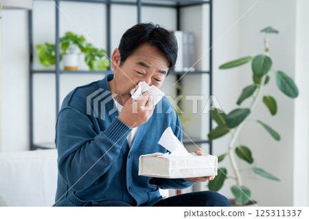 Middle-aged man with hay fever 125311337