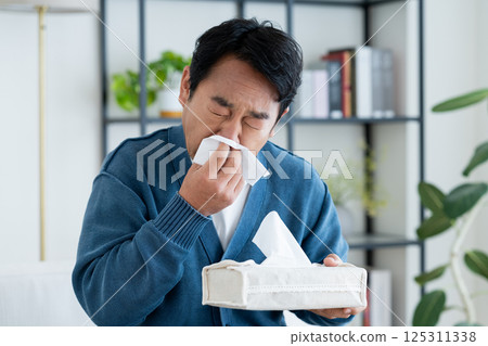 Middle-aged man with hay fever 125311338