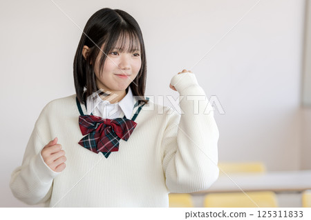 Student doing fist pump Student doing fist pump 125311833