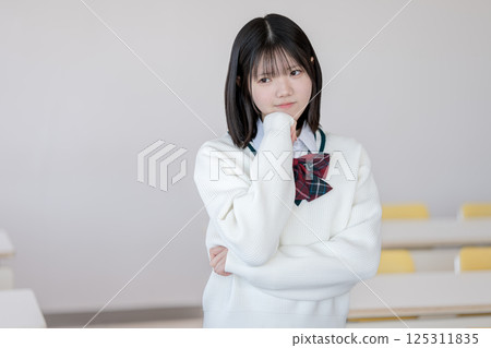 Female student to think 125311835