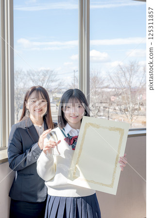 Blue sky and award-winning students and teachers Blue sky and award-winning students and teachers 125311857