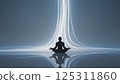 A solitary figure sits cross-legged in a meditative pose, surrounded by a serene and ethereal glow. The gentle light emanates from the center, creating a peaceful atmosphere that promotes relaxation 125311860