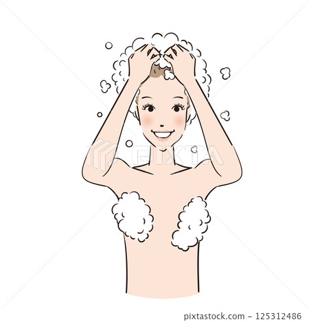 A woman lathering shampoo and washing her hair thoroughly 125312486