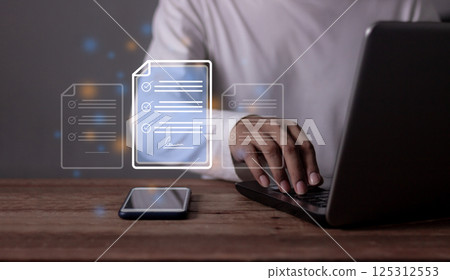 Young man hand with laptop to sign a Online Business Contract, Contract signing, 125312553