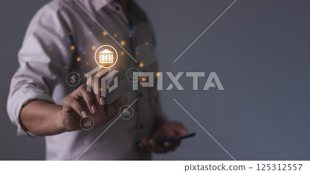 Young man with smartphone mobile hand to visualize bank money growth, 125312557