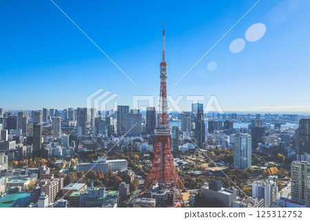 Urban Cityscape Featuring Iconic Red Tower and Skyscrapers, Tokyo Dec 9 2024 Urban Cityscape Featuring Iconic Red Tower and Skyscrapers, Tokyo Dec 9 2024 125312752