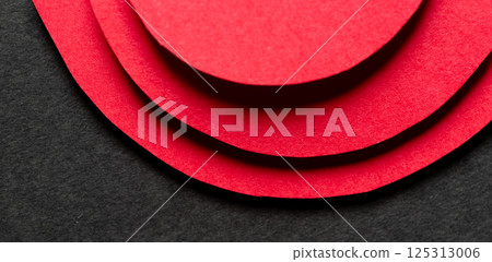 Overlapping circular colored paper background Overlapping circular colored paper background 125313006