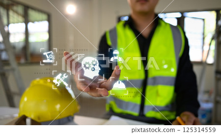 Smart construction technology concept with engineer activating virtual engineering tools 125314559