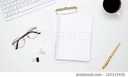 Flat lay composition with copy space. Mock up notebook. Office workspace and productivity concept 125315430