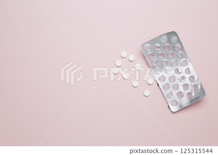 Blister of tablets with pills. Concept of medicine, healthcare, and pharmaceutical industry 125315544
