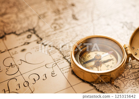 Compass with vintage map Compass with vintage map 125315642