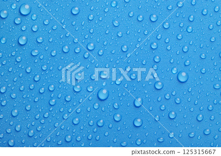Blue water drops background 125315667