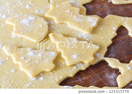 Christmas dough with baking ingredient Christmas dough with baking ingredient 125315774