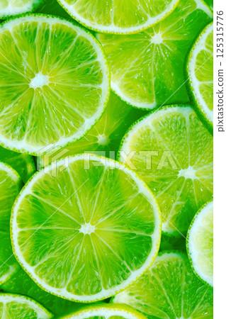 Fresh juicy lime slices 125315776