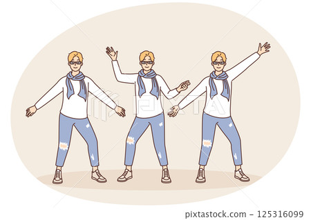 Creative guy in youth fashion clothes posing taking different poses and spreading arms to sides 125316099