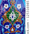 Traditional art of Uzbekistan - pattern of colored tiles on the walls of the mausoleum Gur-Emir 125316985