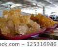 The national Uzbek sweet nawat made from crystallized sugar in the window of the bazaar in Samarkand 125316986