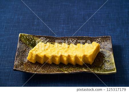 Sliced omelet 125317179