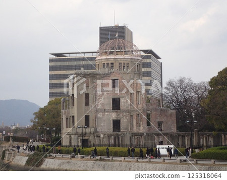 The Atomic Bomb Dome, also known as the Hiroshima Peace Memorial, is an atomic bomb-damaged structure located in Hiroshima City, Hiroshima Prefecture, that conveys the tragedy of the atomic bomb. The Atomic Bomb Dome, also known as the Hiroshima Peace Memorial, is an atomic bomb-damaged structure located in Hiroshima City, Hiroshima Prefecture, that conveys the tragedy of the atomic bomb. 125318064
