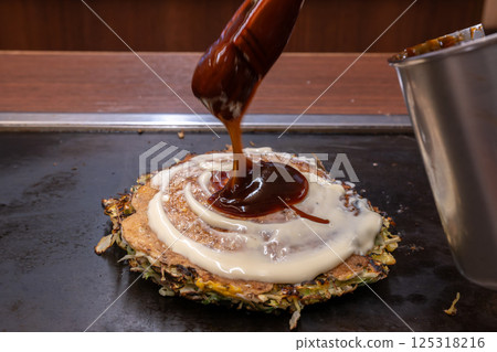 Okonomiyaki: Osaka's soul food 125318216