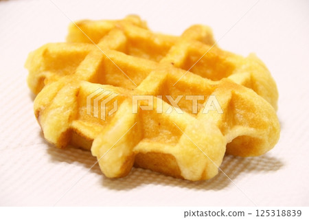 Delicious Belgian waffles Delicious Belgian waffles 125318839